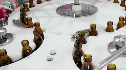 Bottles filler machine Stock Footage 63372411