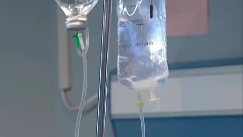 Bottles hanging on the shelf Video stock 253771397