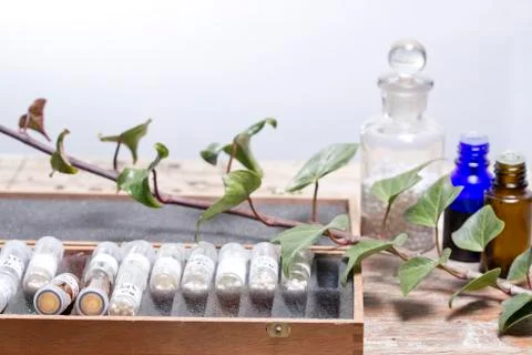 Bottles with homeopathy globules Stock Photos