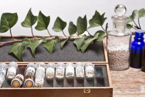 Bottles with homeopathy globules Stock Photos