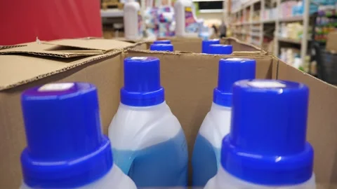Bottles with household chemicals in boxes in a store or warehouse Stock Footage 264802434