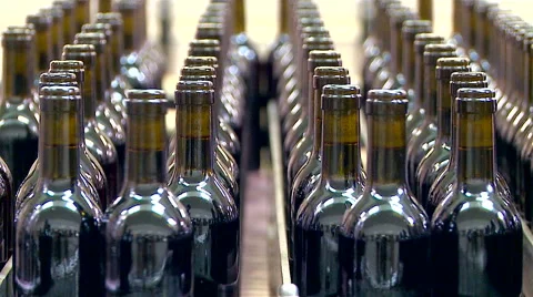 Bottles on a industrial machine. Stock Footage 63174925