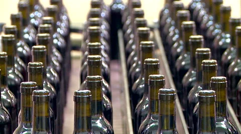 Bottles on a industrial machine. Stock Footage 63174943
