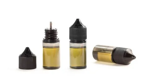 A bottles of liquid for an electronic cigarette. Close up 스톡 사진