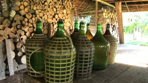  bottles with logs in background in Peru Stock Footage 156860