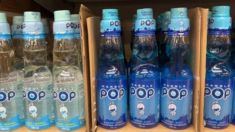 Bottles of Marble Pop Stock Footage 296785240