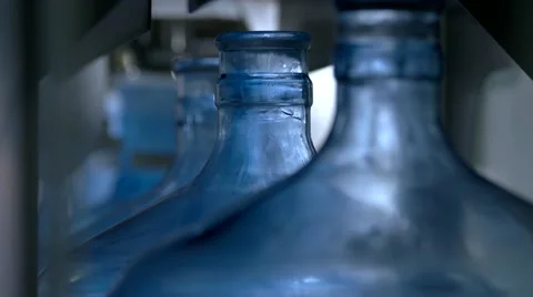 Bottles moving on conveyor. Video stock 68984809
