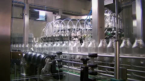 Bottles on a production line Stock Footage 8994464