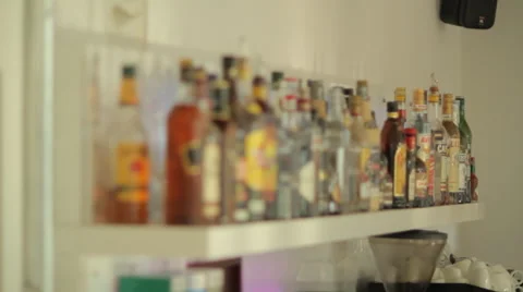 Bottles on a shelf Stock Footage 63599707