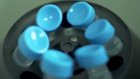 Bottles spinning in the laboratory Видео 153900280