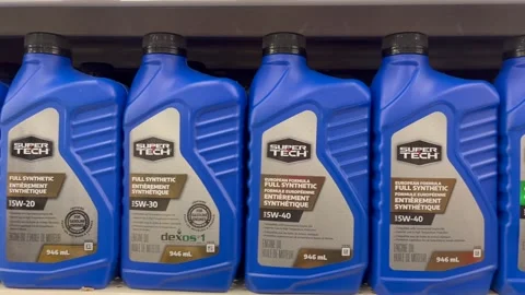 Bottles of Super Tech engine oil  Stock Footage 262797307