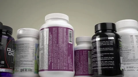 Bottles with Vitamins and Supplements Stock Footage 73832283