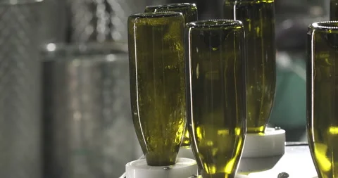 Bottles washing process on conveyor line. Wine alcohol production factory. Wine Stock Footage 255382821