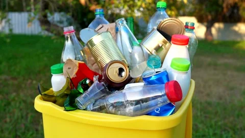 Bottles in Waste container. Waste sorting for Recycling. Stock Footage 286381279