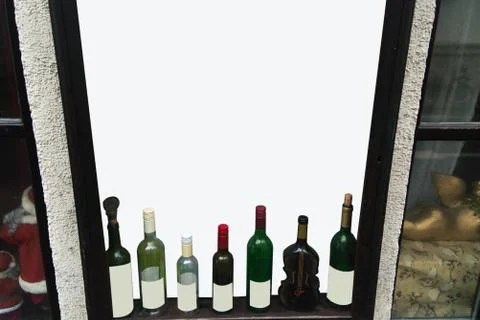 Bottles in the window on a white background mockup Stock Photos