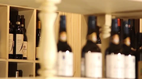 Bottles of wine on the shelves Stock Footage 46070712