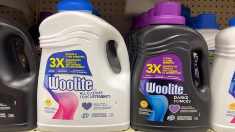 Bottles of Woolite darks and all clothes laundry detergent Stock Footage 252698366