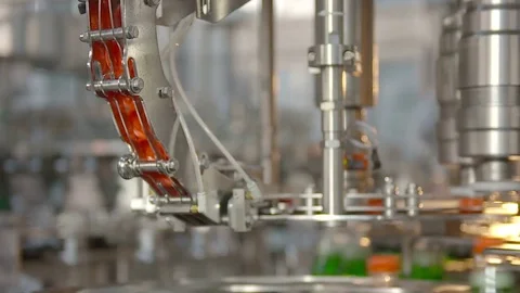 Bottling of lemonade in plastic bottles. Lemonade bottle conveyor industry. Stock Footage 76345826