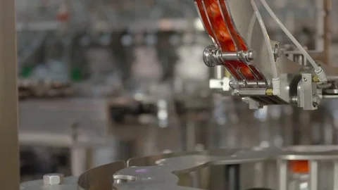 Bottling of lemonade in plastic bottles. Lemonade bottle conveyor industry. Video stock 76345840