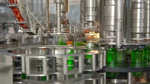 Bottling of lemonade in plastic bottles. Lemonade bottle conveyor industry. Video stock 76346967