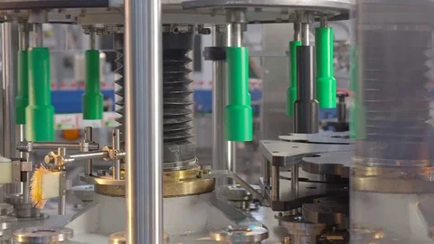 Bottling of lemonade in plastic bottles. Lemonade bottle conveyor industry. Video stock 76347237