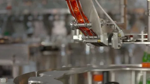 Bottling of lemonade in plastic bottles. Lemonade bottle conveyor industry. Video stock 76347809