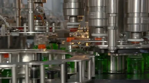 Bottling of lemonade in plastic bottles. Lemonade bottle conveyor industry. Video stock 76347891