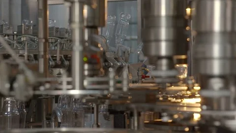 Bottling of lemonade in plastic bottles. Lemonade bottle conveyor industry. Video stock 76348676