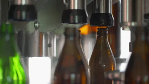Bottling Line. Brewing technology. Bottles Moving on Conveyor Belt at Glass Vidéo 245277710