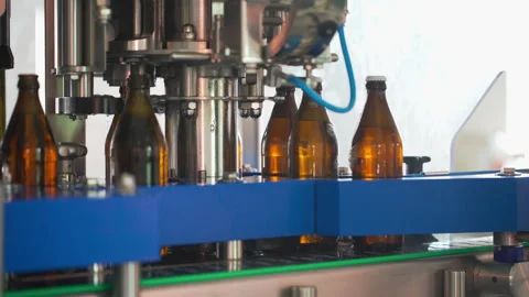Bottling Line. Brewing technology. Bottles Moving on Conveyor Belt at Glass Vidéo 245278978
