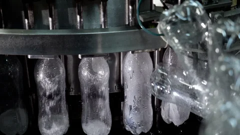 Bottling of liquids in plastic containers, packaging, bottles on conveyor line. Stock Footage 119555436