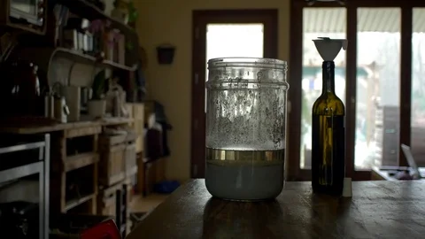 Bottling lye and ashes Stock Footage 71193145