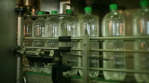 Bottling of mineral water in plastic bottles. 2 shot Stock Footage