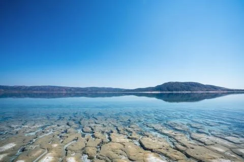 The bottom and surface with crystal clean water of Salda Lake in Turkey. Travel Stock Photos