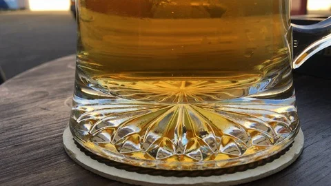 Bottom of a beer stein, carbonation bubbles, outside. Stock Footage 92827043