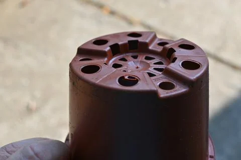 Bottom of a brown flower pot Stockfoto's