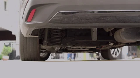 The bottom of the car speeding up the car run forward Stock Footage 186961479