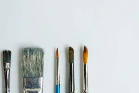 At the bottom, on a clean white sheet, there are brushes for drawing with pai Stock Photos