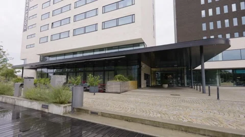 The bottom of the facade of an office building in an urban area Video stock 246328010