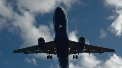 A bottom of a flying aircraft Stock Footage 115079469