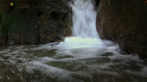 Bottom off a littel waterfall Stock Footage 68035991