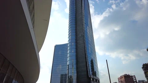 Bottom-up overview of the Unicredit Tower in Piazza Gae Aulenti Stock Footage 155653390