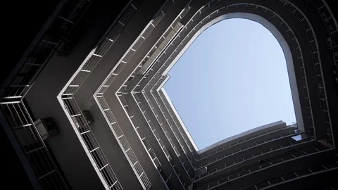 A bottom perspective of rounded shaped building. Real estate. Modern building 動画素材 129854069