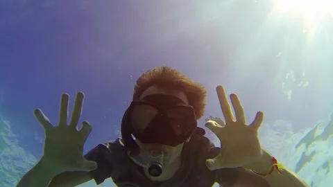 Bottom-up Perspective of Snorkeler off Similan Islands in Thailand Vídeos de archivo 87822574