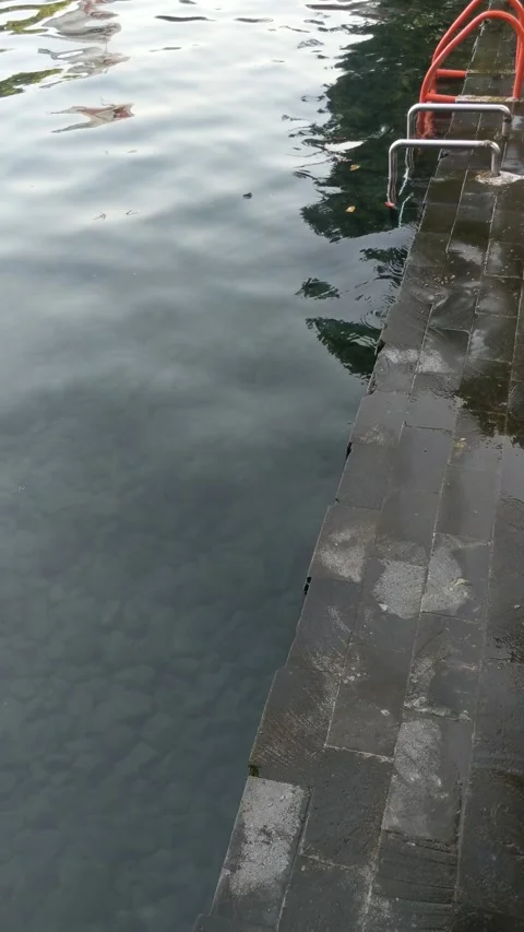 The bottom of the pool is clearly visible because the pool water is clear Video stock 280348642