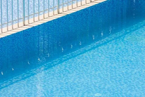 The bottom of the pool, decorated with blue ceramic mosaic Stock Photos