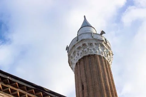 Bottom shoot of old ottoman built mosque minaret with masonry structure in lo Stock Photos