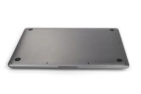 Bottom of a slim laptop on a white background Stock Photos