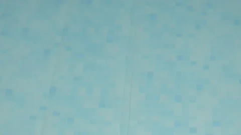 Bottom of Swimming Pool through Water Stock Footage 134856805