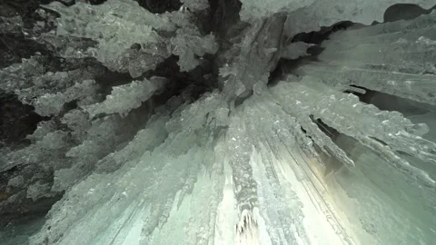 From bottom to top Baikal ice in ancient cave sharp best icicles ice formations Stock Footage 317963444